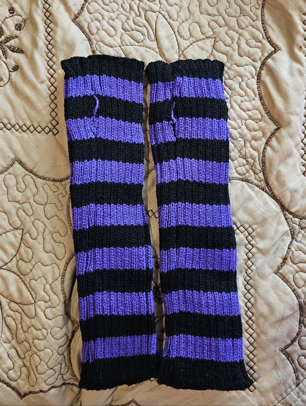 black and purple arm warmers